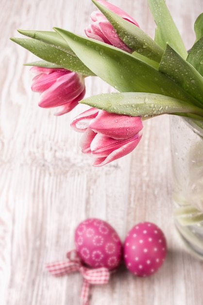 Tulips and Easter eggs on the table