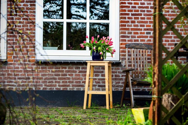 Tulips in a vase in the garden