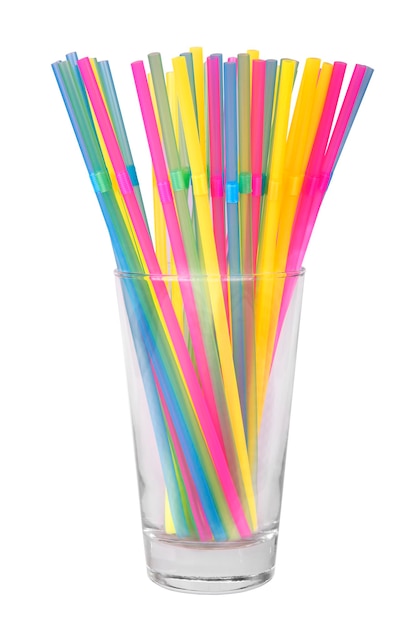 Tumbler with colored straws isolated on white background