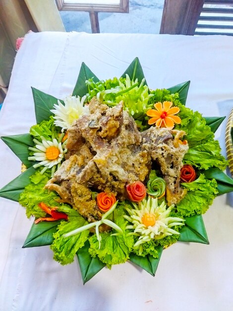 Photo tumpeng friend chicken for ceremony