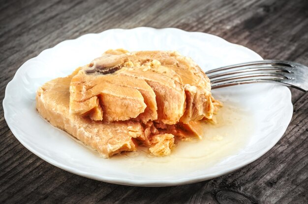 Tuna meat on white plate