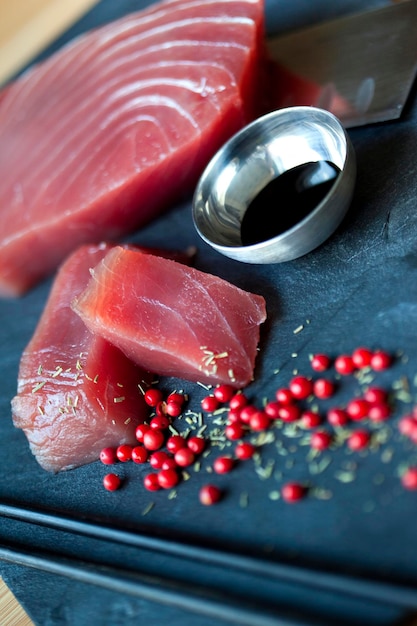 Tuna and peppers on a slate