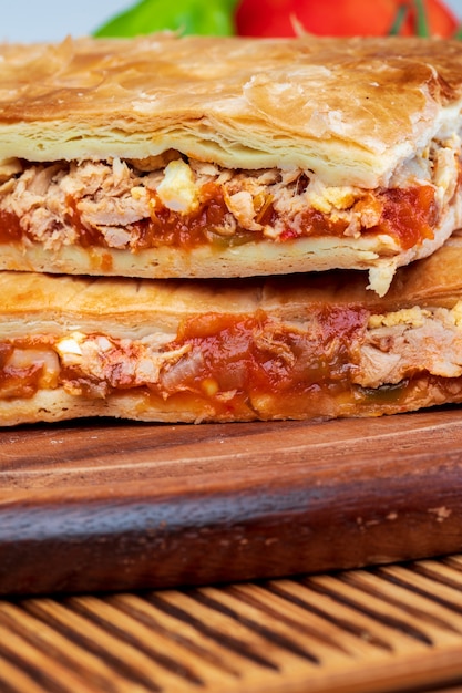 Tuna pie. Typical Galician dish (Galicia) and Spain. With natural ingredients such as tomato, onion, pepper, eggplant, tuna, boiled egg, wheat and vegetable oil.