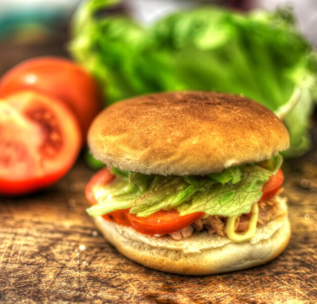 Tuna sandwich on a wooden table