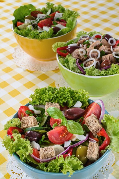 Tuna, Vitaminic green and Greek salad with feta and tasty selection of vegetables.