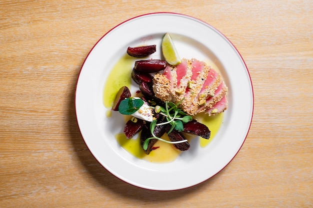 Tuna with beetroot Seafood dish with vegetables