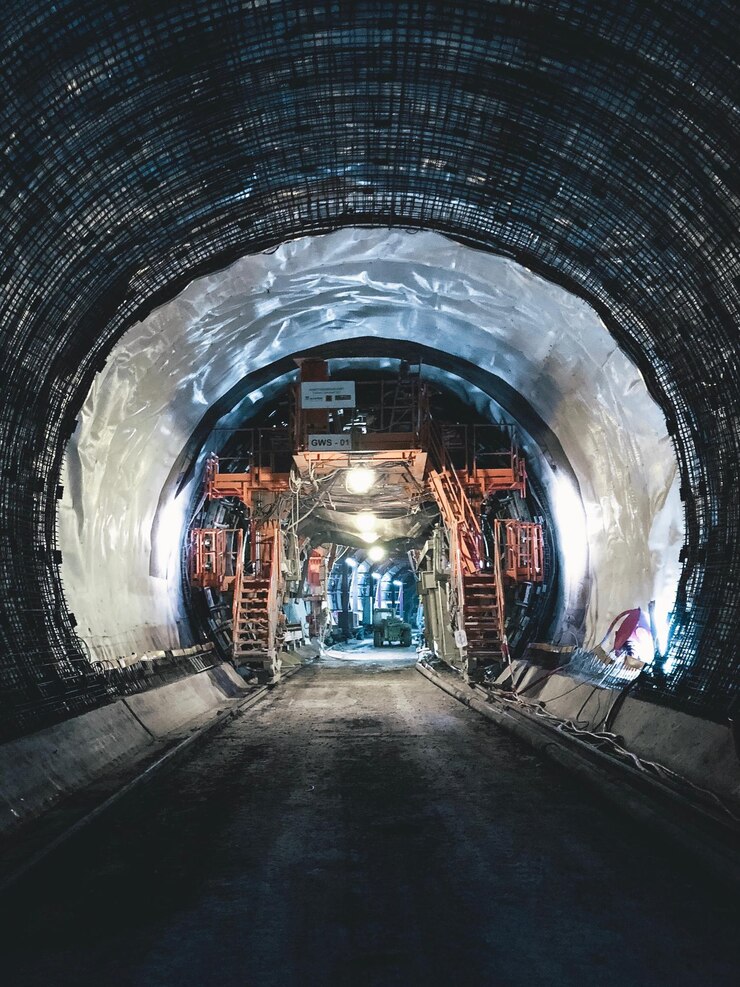 Photo tunnel leading towards industry