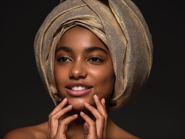 Turban woman african ethnic beautyface clean healthy skin close up portrait