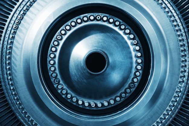 Turbine generator rotor with blades and discs, interior view. Elements, details and mechanisms of turbines. Energy and mechanical engineering