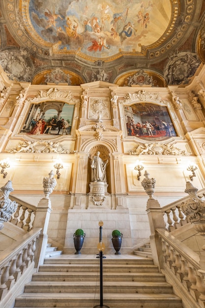 Turin, Italy - Circa August 2021: marble staircase in historic palace with luxury interior - Savoia Royal Palace