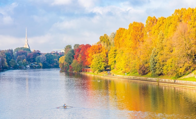 Turin Piedmont Region Italy Circa November 2021 landscape in autumn with Po' river and blue sky