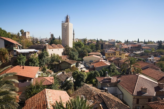 Turkey, Antalya, rooftops of Old Town with covered Yivli Minare