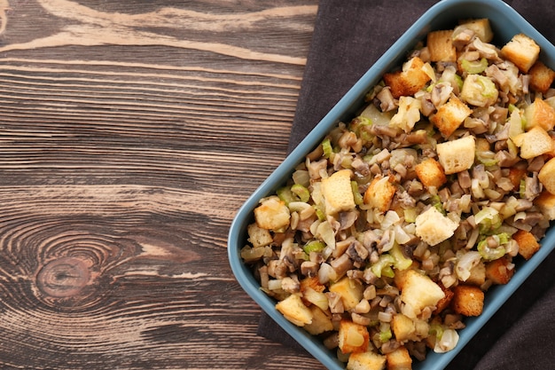 Turkey stuffing in casserole dish for holiday table, top view