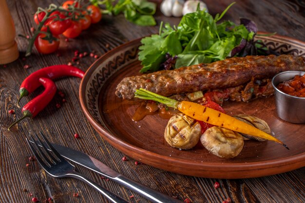 Turkish and Arabic Traditional Ramadan mix kebab plate, Kebab beef with baked vegetables