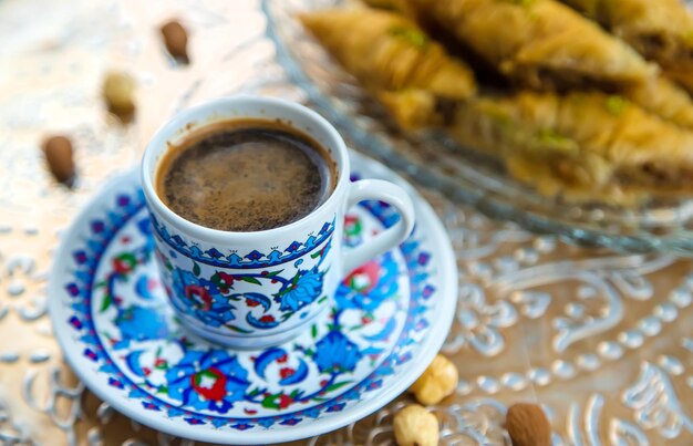 Turkish baklava and coffee on the table Selective focus Nature