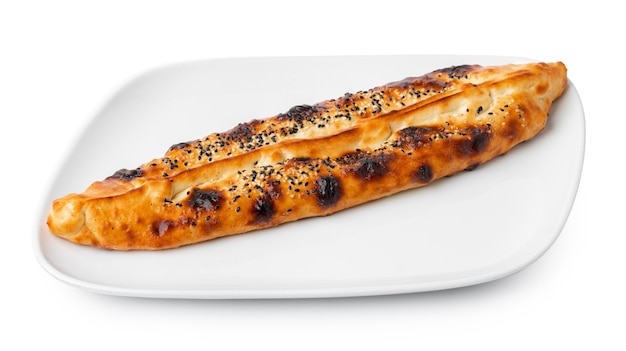 Turkish boatshaped flatbread pide isolated on white