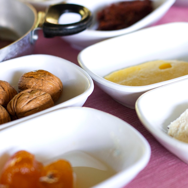 Turkish breakfast. Large walnuts, orange jam, butter