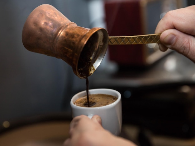 Turkish coffee cooked in the sand making turkish coffee