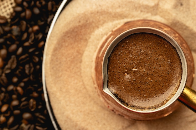 Turkish coffee prepared in sand