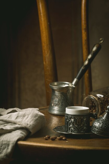 Turkish coffee and traditional copper serving set over vintage