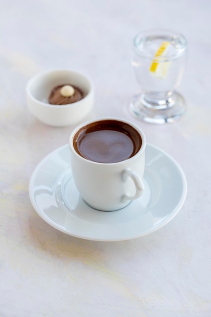 Turkish coffee on a white wood background