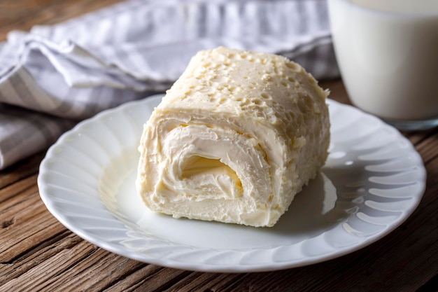 Turkish creamy dairy product. Clotted cream (butter cream) for Turkish breakfast with glass of milk. (Turkish name; kaymak)