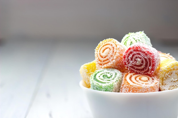 Turkish delight in a white bowl on a white table