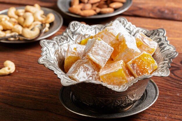 Turkish delight on a wooden table.