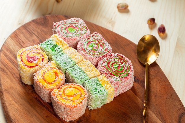 Turkish delight on a wooden table.