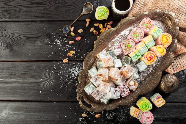 Turkish delight on a wooden table.