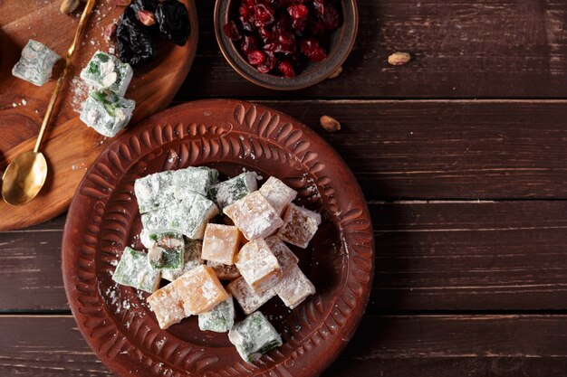 Turkish delight on a wooden table.