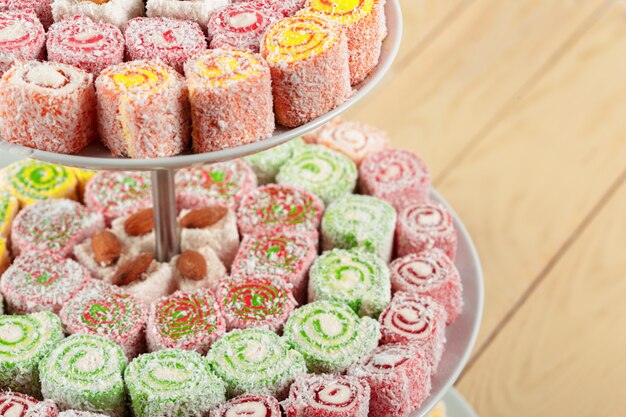 Turkish delight on a wooden table.