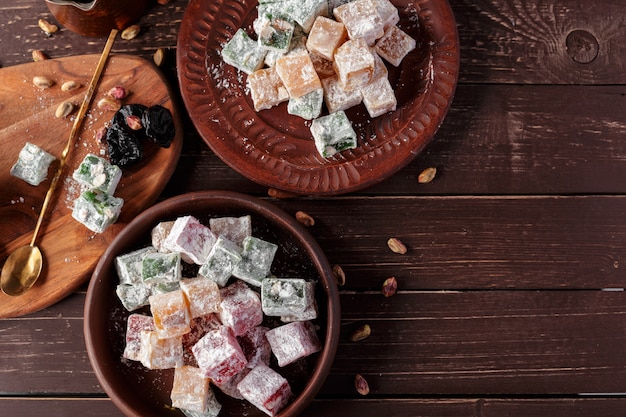 Turkish delight on a wooden table.