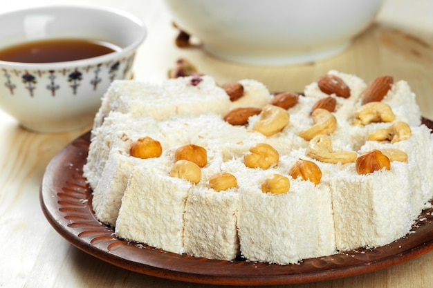 Turkish delight on a wooden table.