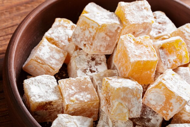 Turkish delight on a wooden table. 