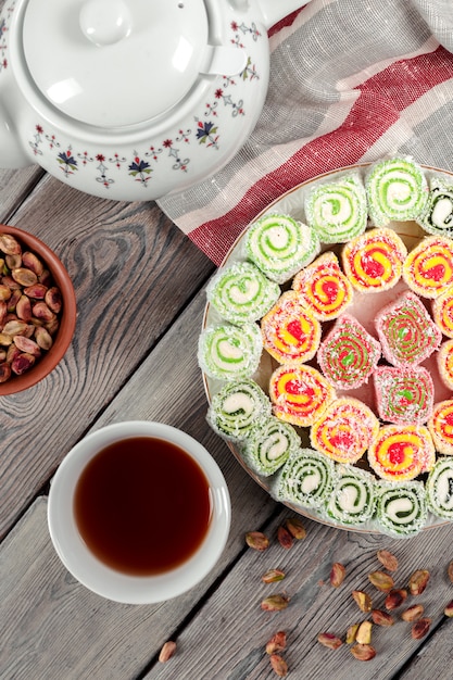 Photo turkish delight on a wooden table.