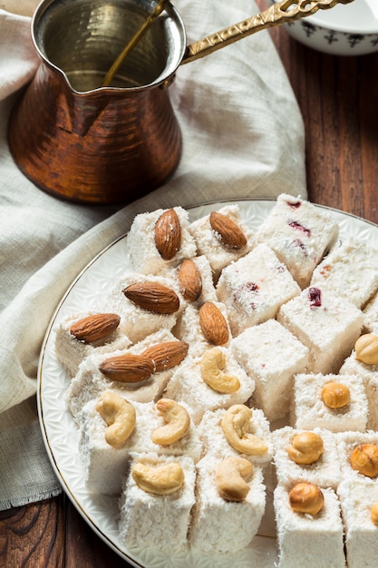 Turkish delight on a wooden table.