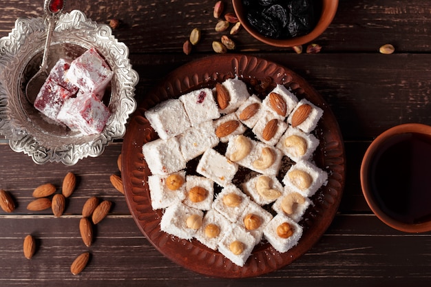 Turkish delight on a wooden table.