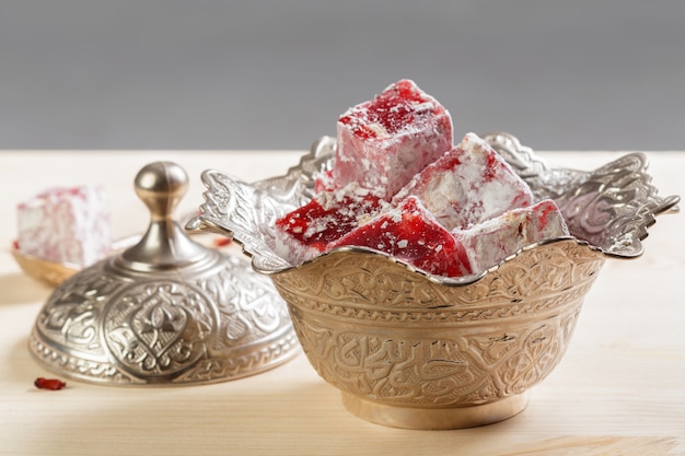 Turkish delight on a wooden table.