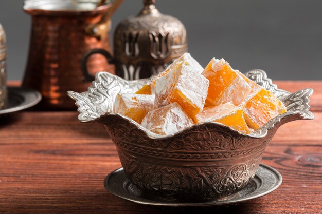 Turkish delight on a wooden table.