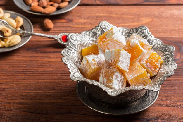 Turkish delight on a wooden table.