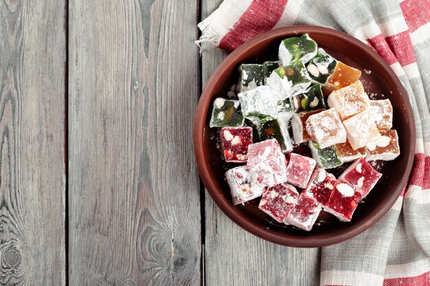 Turkish delight on a wooden table.