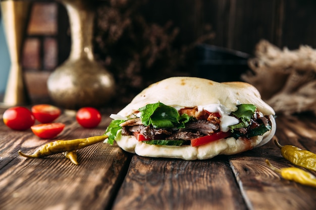 Turkish doner in pita bread with marinated meat