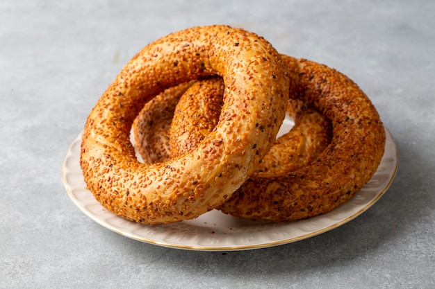 Turkish fast food bagel called Simit. Turkish bagel Simit with sesame. Bagel is traditional Turkish bakery food.