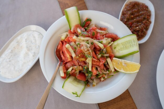 Turkish food in a cafe. Mix of vegetables in the form of a salad.