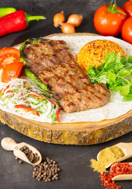 Turkish food kofte stack of meatballs with rice