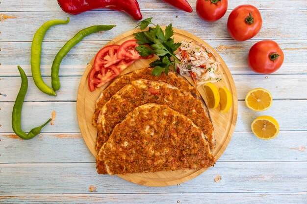 Turkish food lahmacun Turkish pizza lemon parsley top wiev