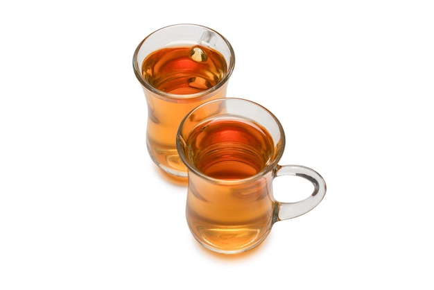 Турецкий стакан чая на белом фоне