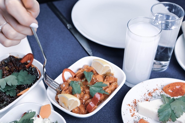 Turkish and Greek Traditional Dinning Table with Special Alcohol Drink Raki Ouzo and Turkish Raki i
