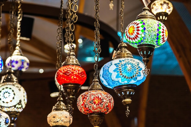 Turkish luminous chandeliers hanging from the ceiling in the Istanbul Bazaar